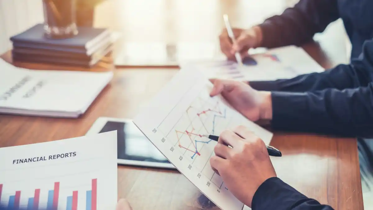 People reviewing financial reports